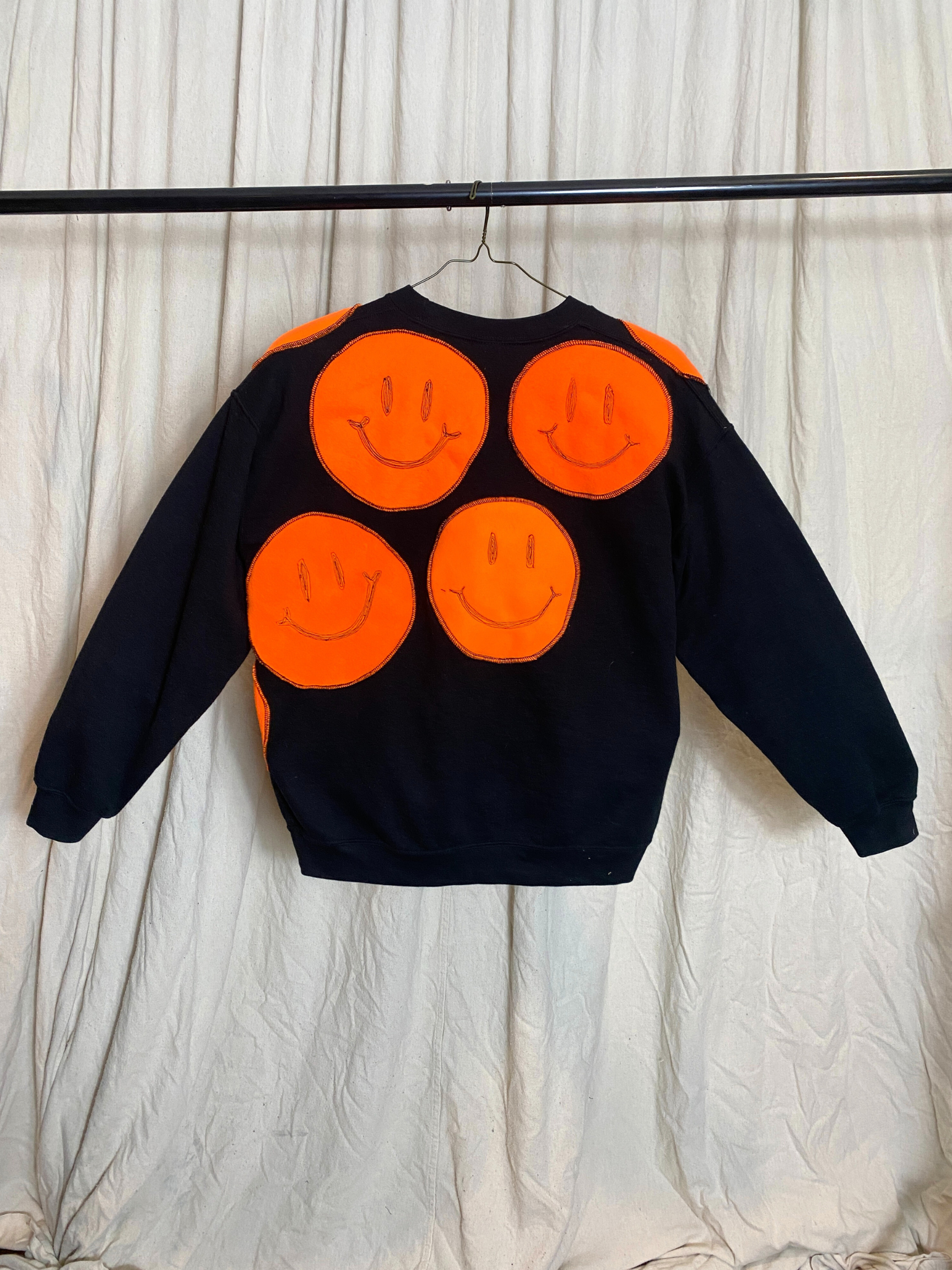 Moody Genderless Sweatshirt- Black Crewneck with Orange Fleece Patches of Smiley Faces