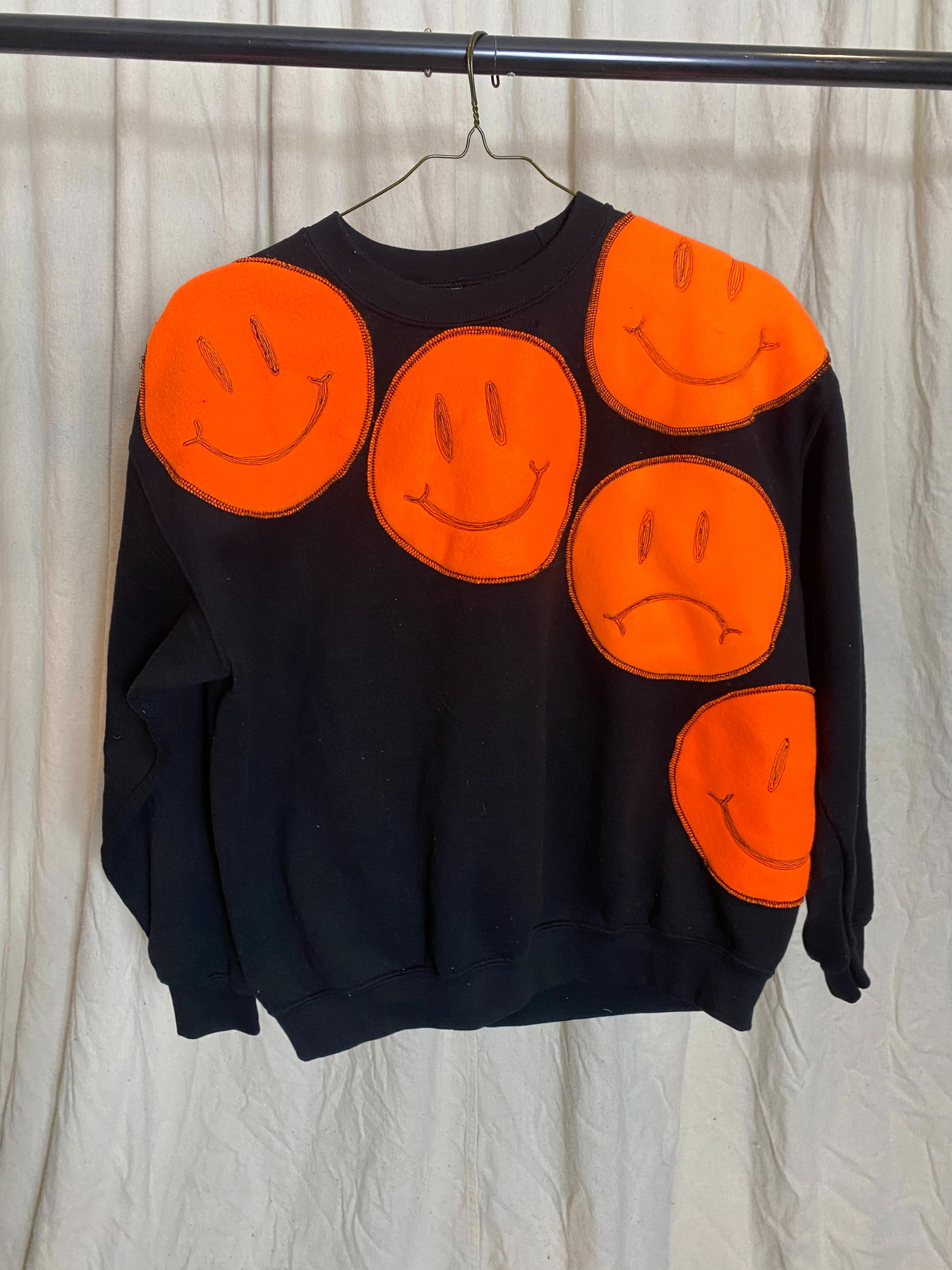 Moody Genderless Sweatshirt- Black Crewneck with Orange Fleece Patches of Smiley Faces